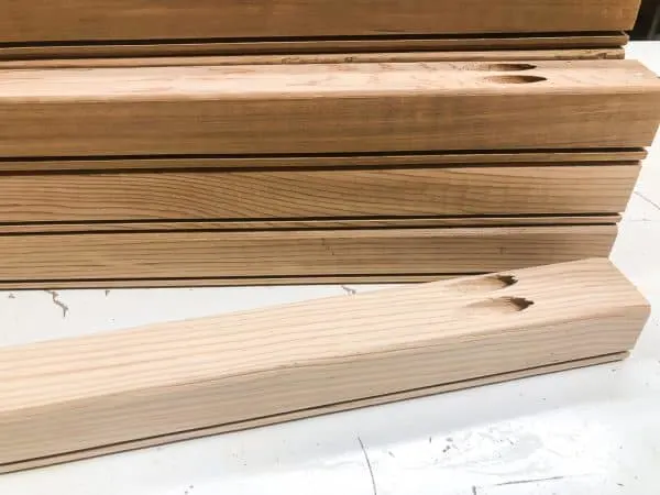 grooves and pocket holes cut into 2x2 cedar boards