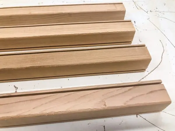cedar 2x2 boards with grooves cut along length