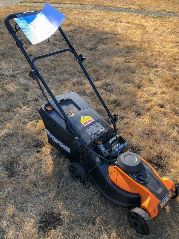 Worx electric lawn mower with free sign