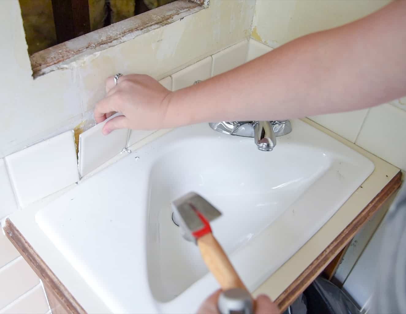 removing tiles from around a vanity sink