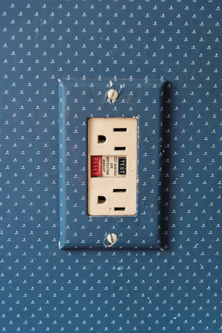 wallpaper covered outlet