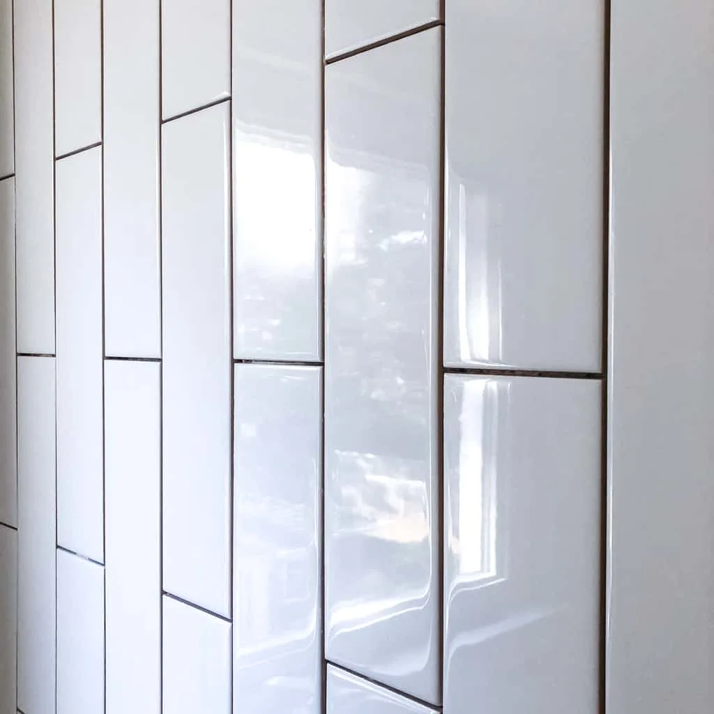 white vertical subway tile pattern