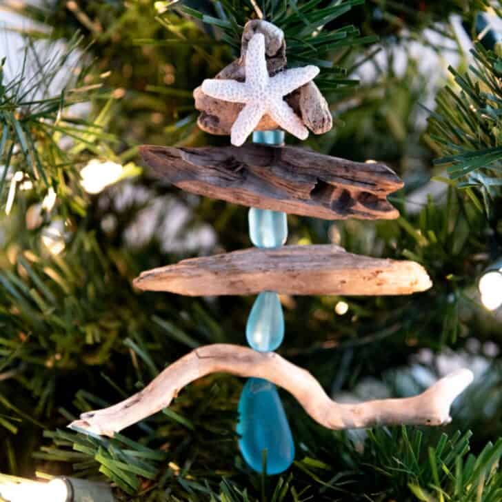DIY driftwood Christmas ornament hanging in tree
