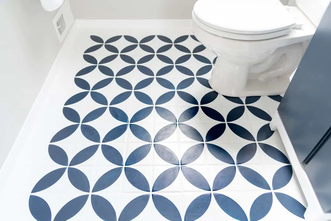 painted tile floor in half bathroom