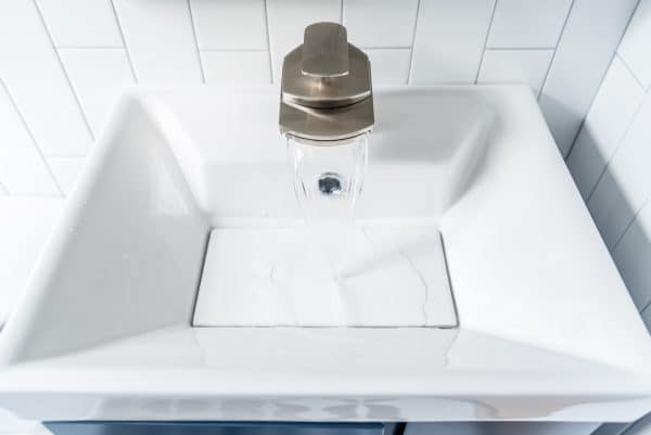 new sink and faucet in DIY half bath remodel