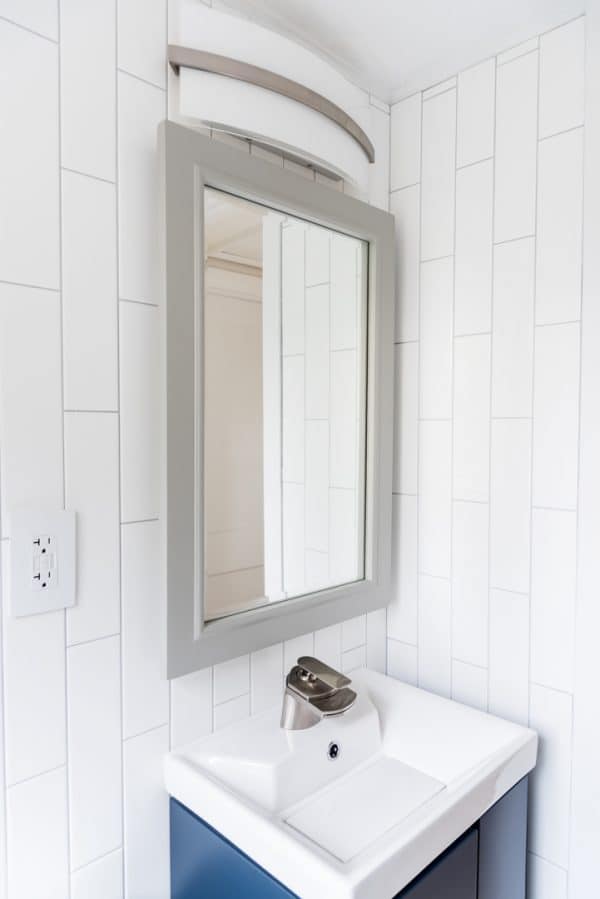 new light fixture, mirror and vanity in DIY half bath remodel