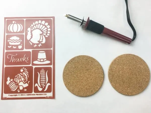 wood burning tool, stencils and cork coasters