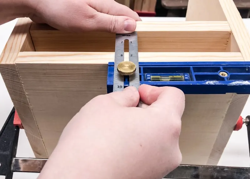 measure shelf placement of lego bin