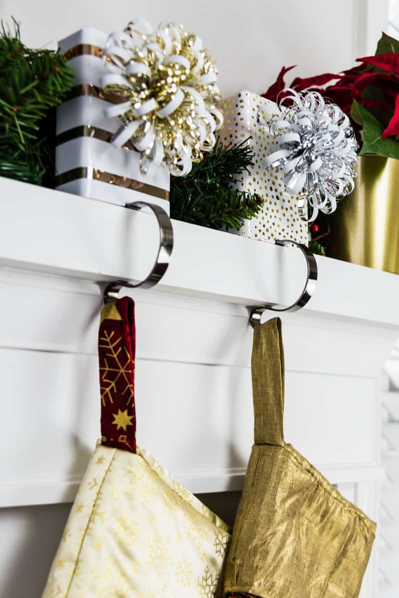 stocking hooks gripping mantel