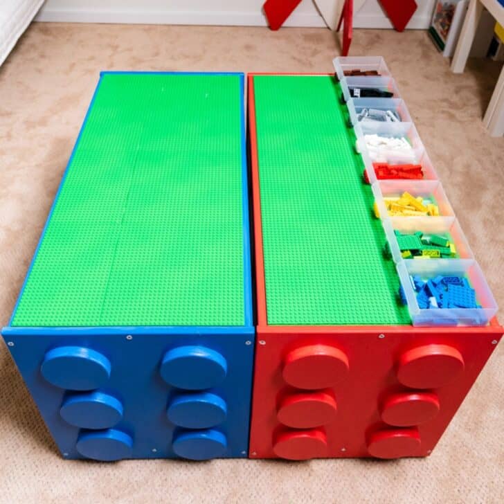 two IKEA Lego tables painted to look like giant Lego pieces
