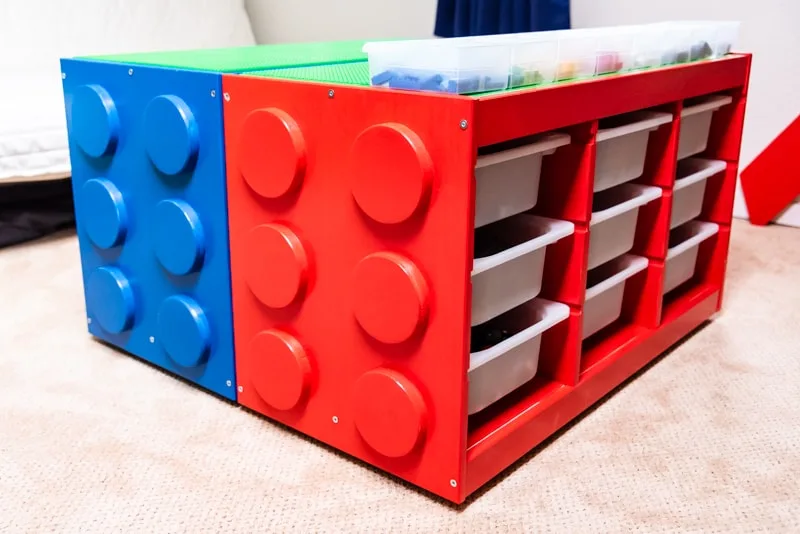 two IKEA Lego tables made from IKEA Trofast drawer units, made to look like giant Lego bricks