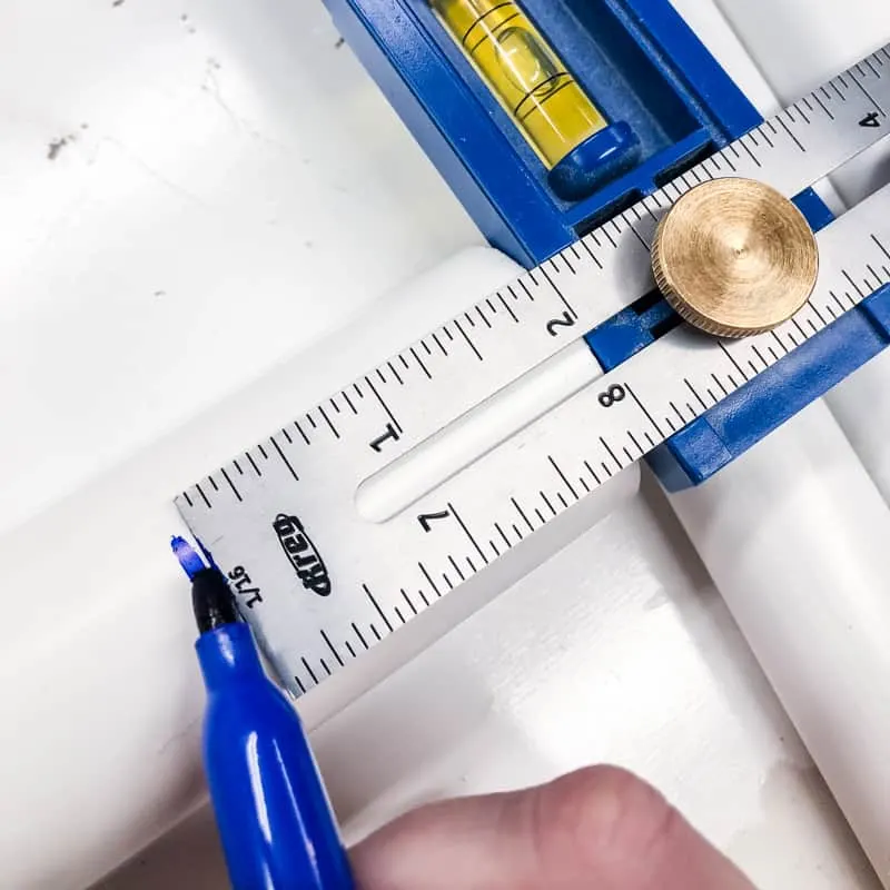 marking 2 inch section of PVC pipe