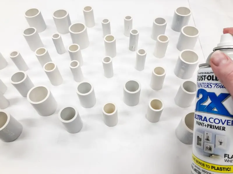 spray painting PVC pipe pieces white