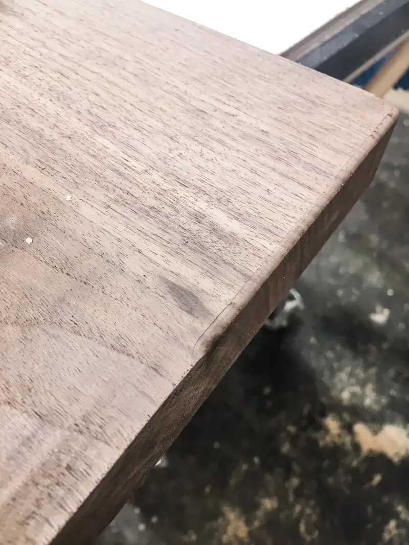 walnut board with sharp corner and rounded over corner for comparison