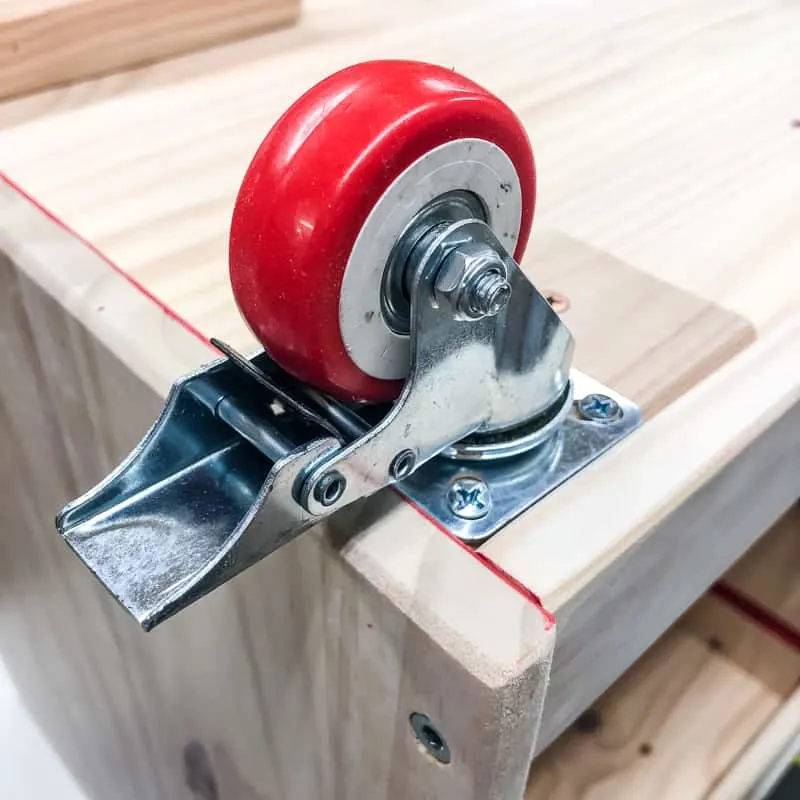 casters attached to bottom of benchtop tool stand