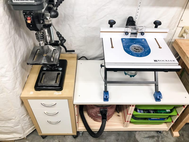drill press and router table on top of IKEA furniture pieces