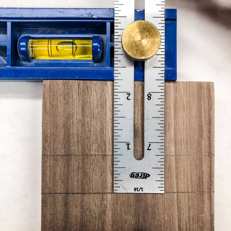 marking the top and bottom of a dado with the Kreg Multi-Mark tool