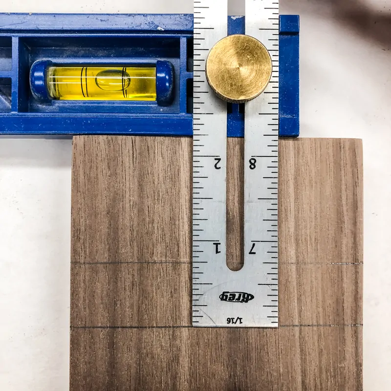 marking the top and bottom of a dado with the Kreg Multi-Mark tool