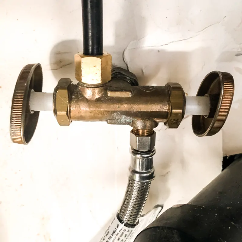 cold water pipe splitter under kitchen sink