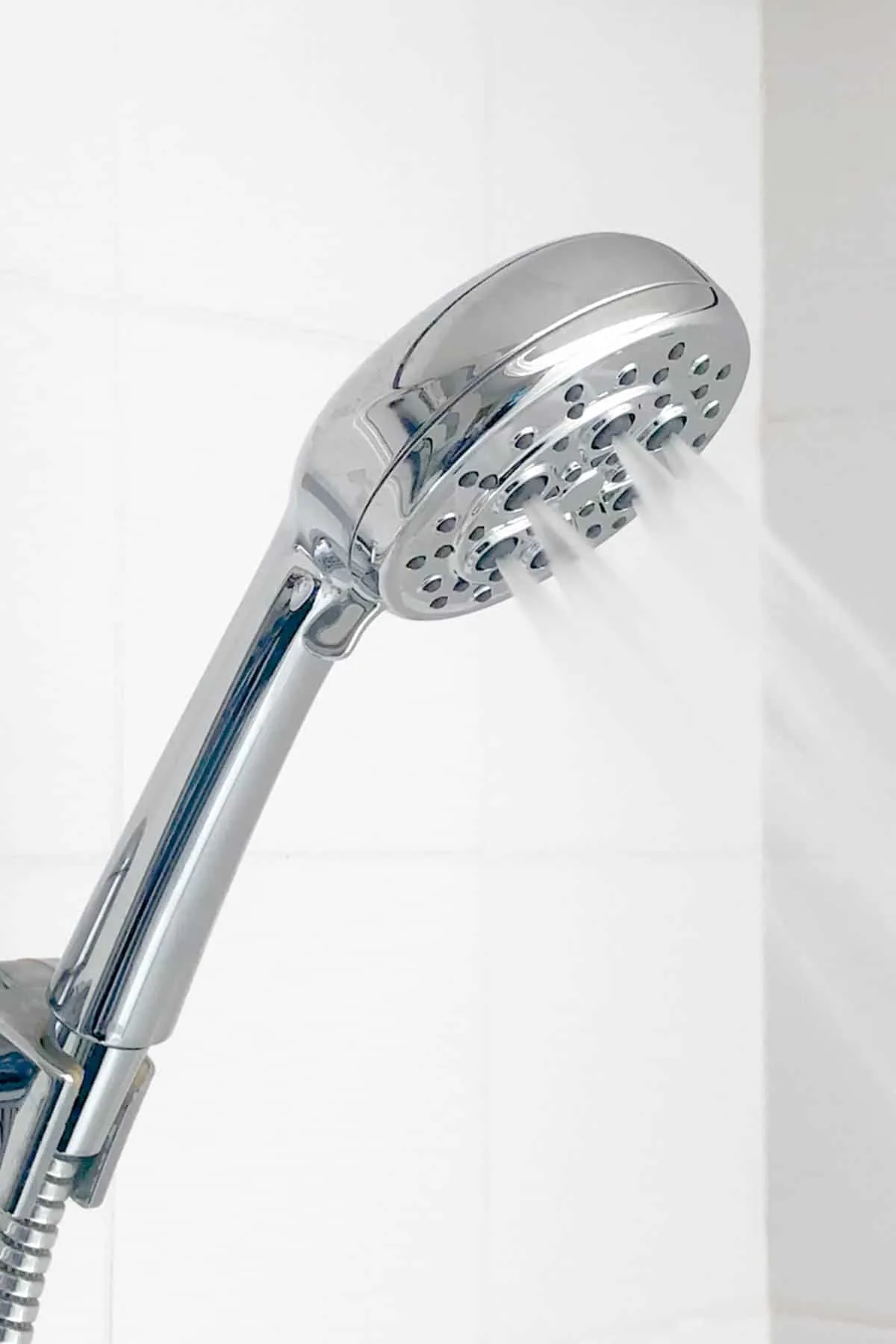 new Pfister Vie handheld shower head mounted in bracket