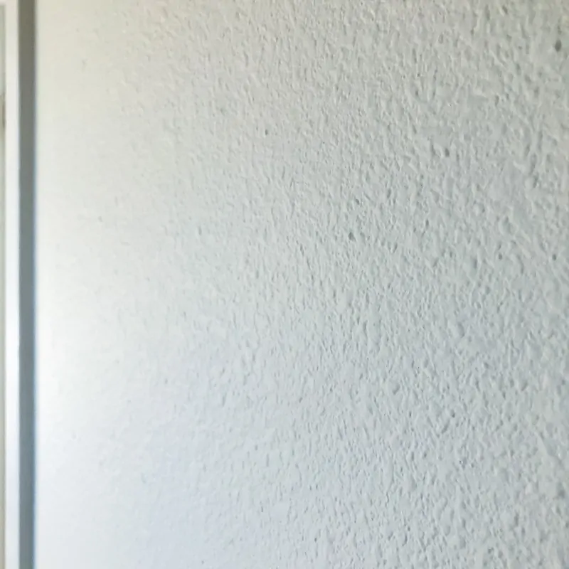 white heavily textured wall