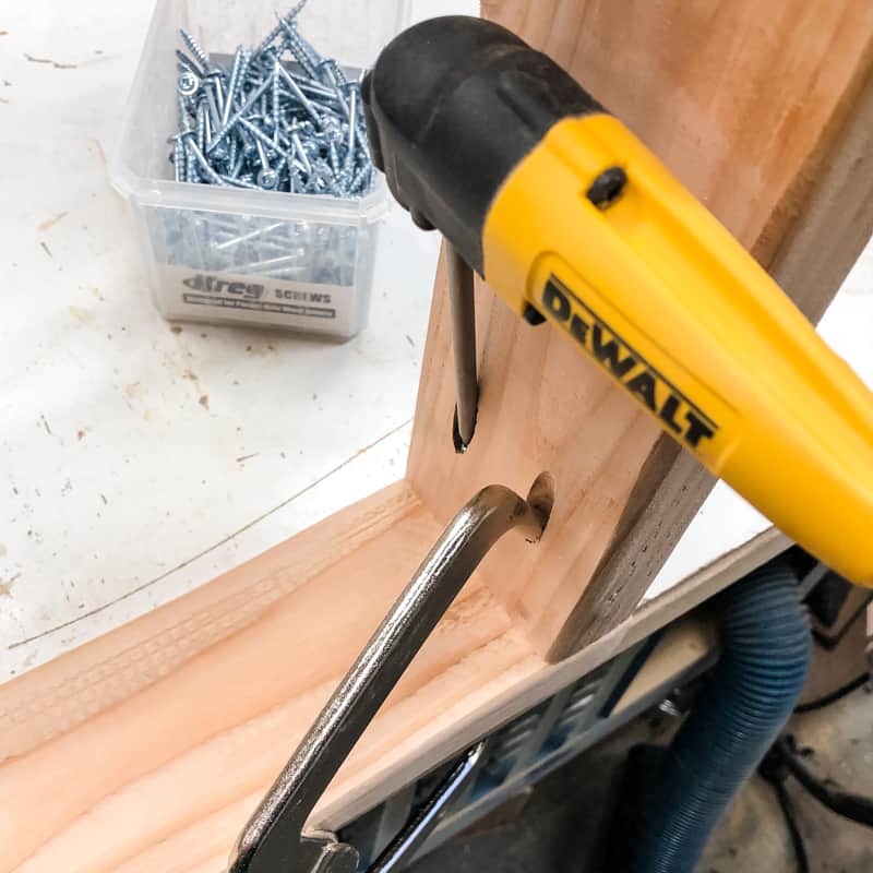 right angle clamp and drill attachment help to assemble garage shelves