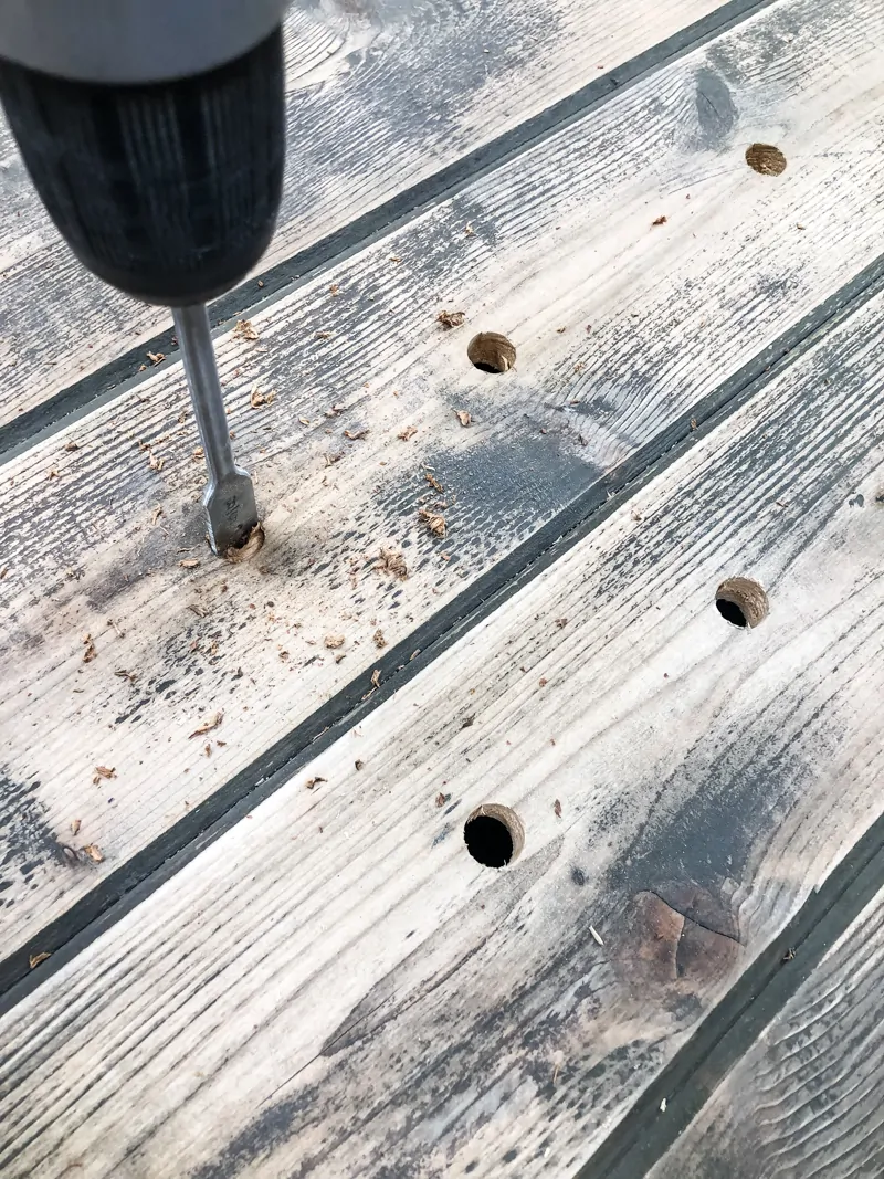 drilling holes in top of DIY potting bench
