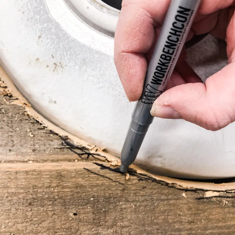 marking tight spot under potting bench sink