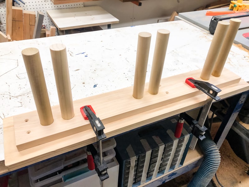 DIY ski rack clamped to workbench