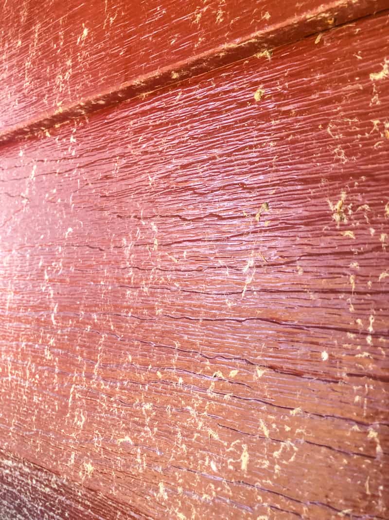 dirty red aluminum siding
