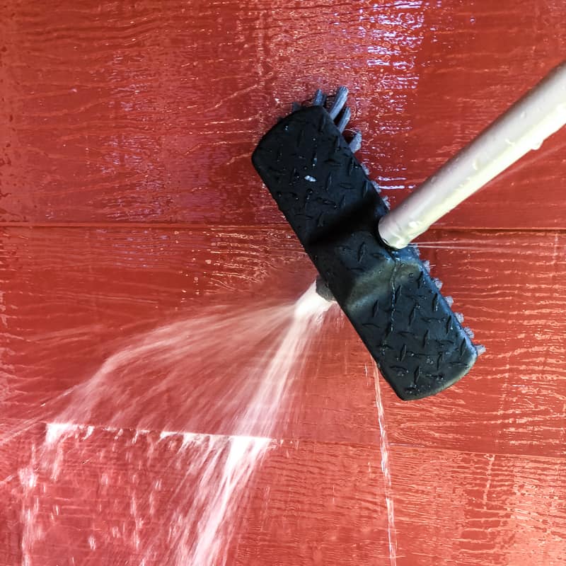siding brush with water coming out