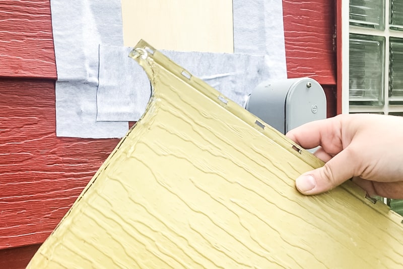 gutter sealant applied to back of aluminum siding