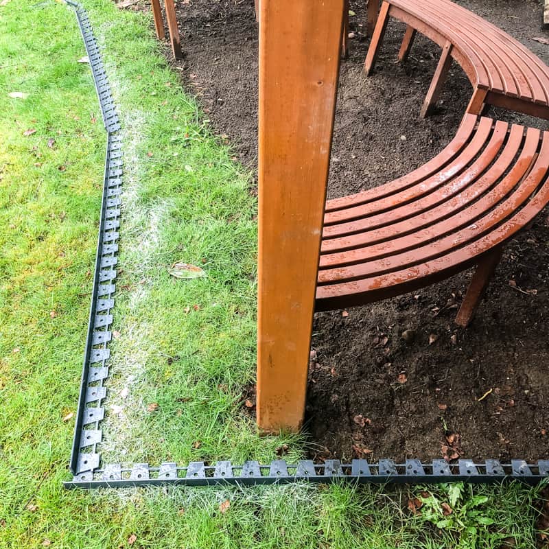 marked out border for pea gravel patio