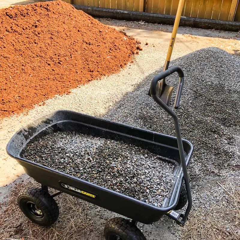 pea gravel and mulch pile in driveway