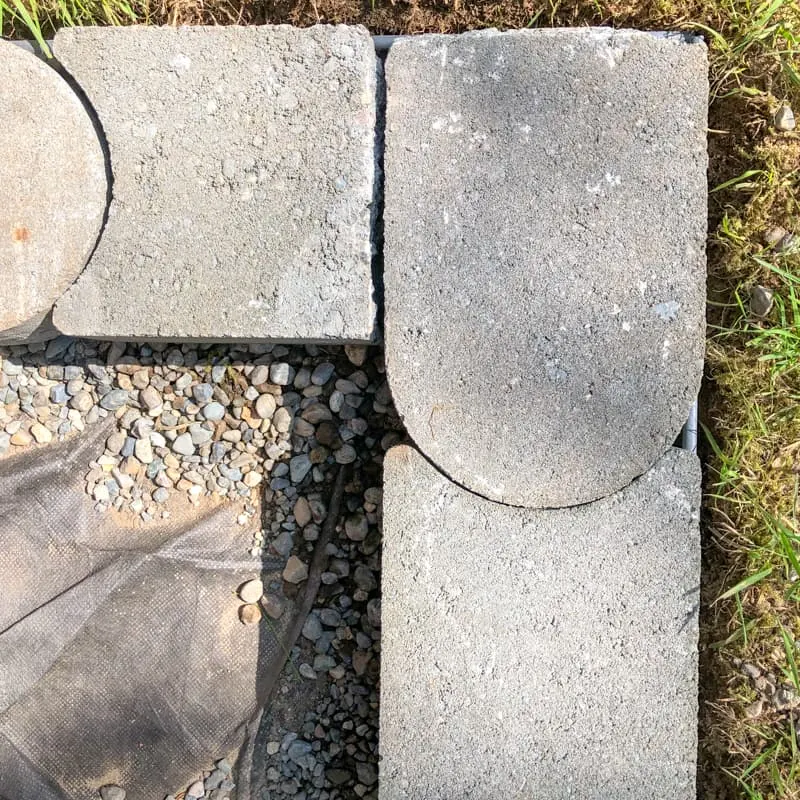 curved concrete pavers forming a 90 degree angle