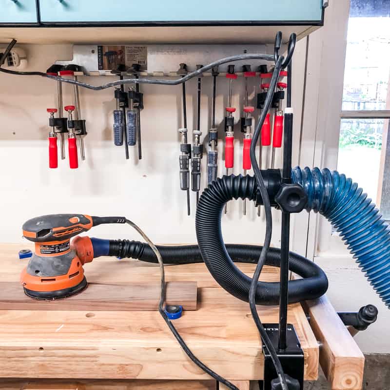 sanding station attached to wall mount dust collector