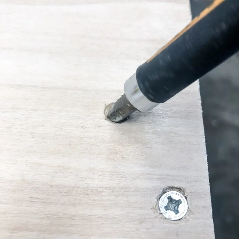 using a Philips head drill bit to create a countersink hole