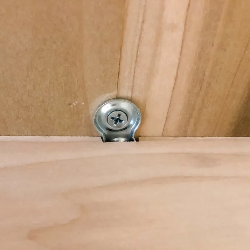 table top screwed in place with figure 8 fasteners