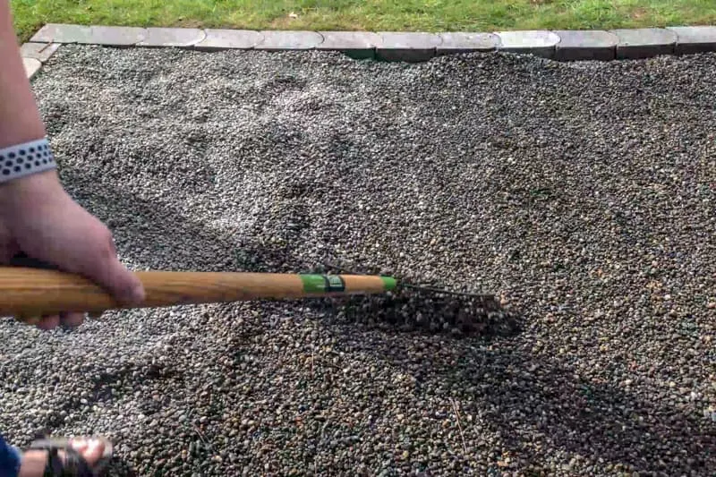 raking pea gravel patio level