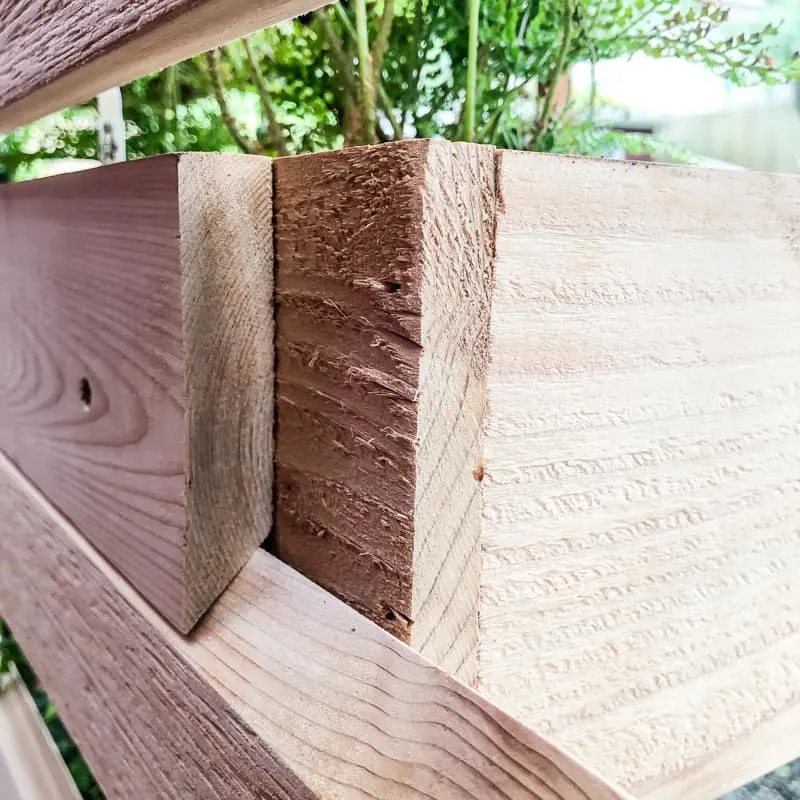 French cleat on back of planter box hooked to vertical garden wall