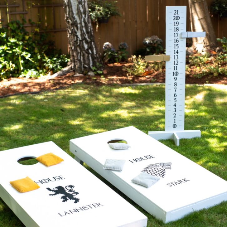 DIY cornhole scoreboard and two cornhole boards