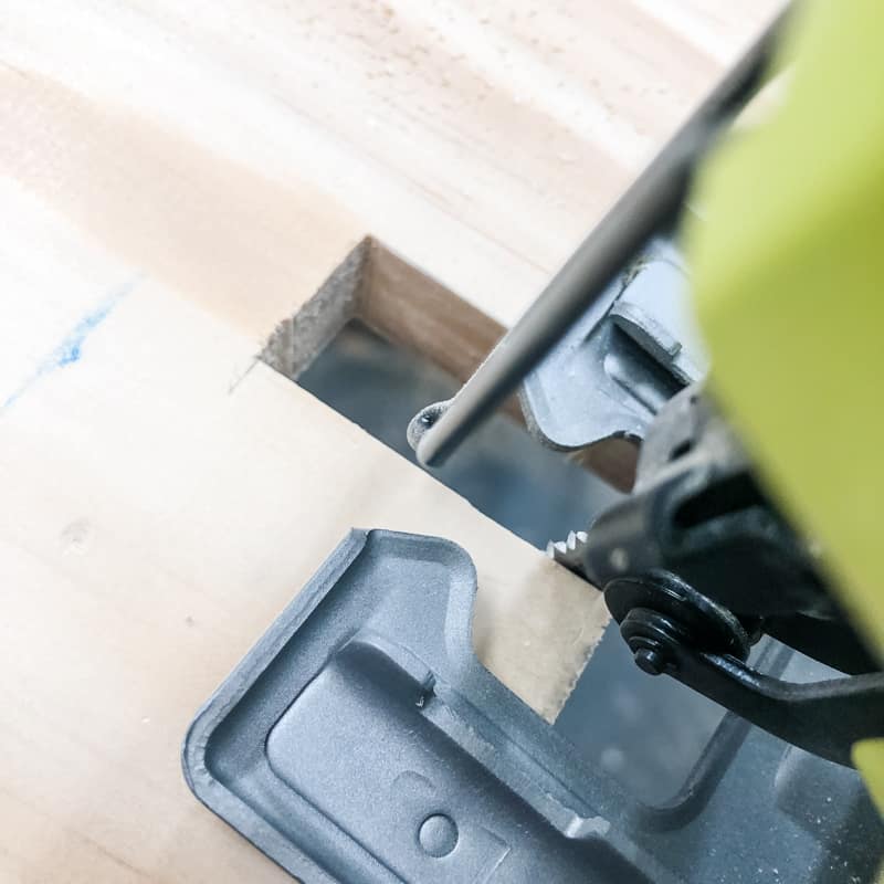 cutting notch in base of cornhole scoreboard