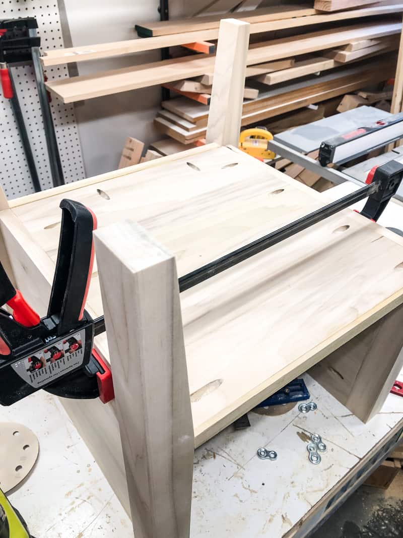 DIY nightstand bottom clamped in place