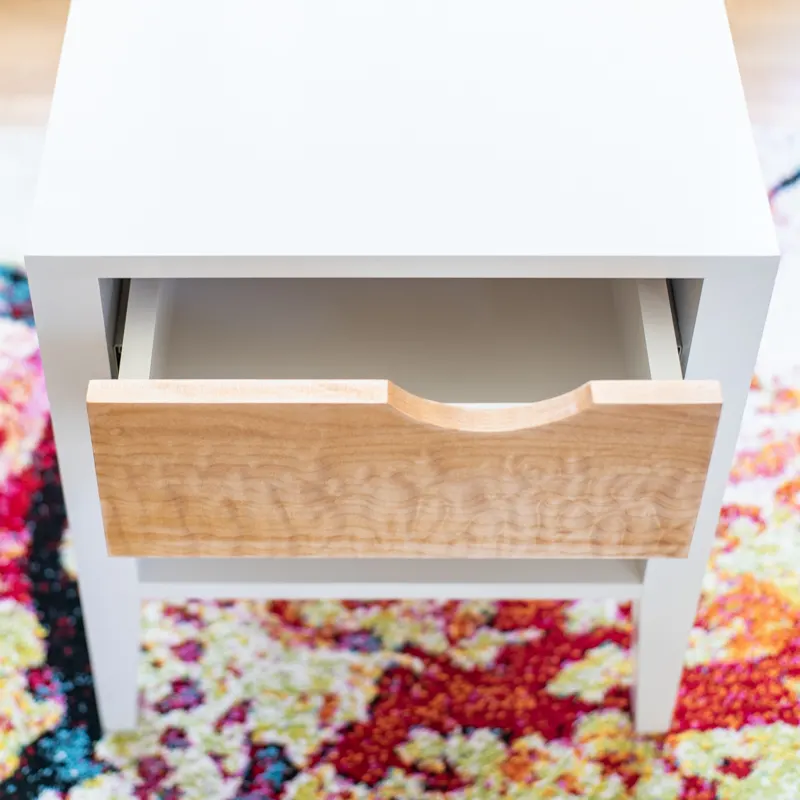 DIY nightstand with notched drawer front with drawer partially open