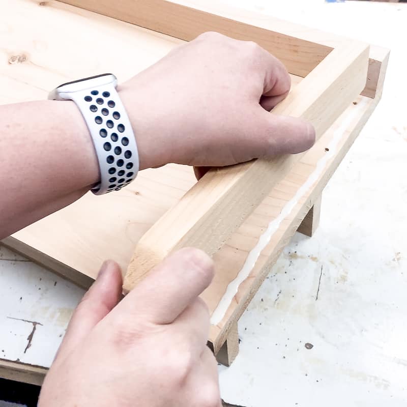 lining up rim pieces around outside edge of balcony railing table