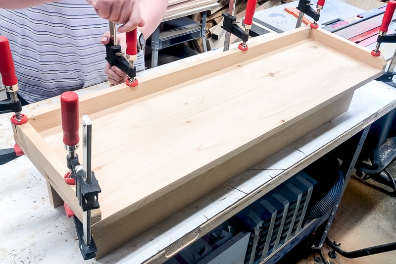 clamped rim pieces on balcony railing table