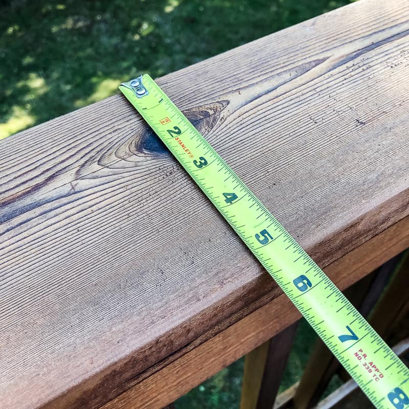 measuring the width of the railing for a balcony railing table