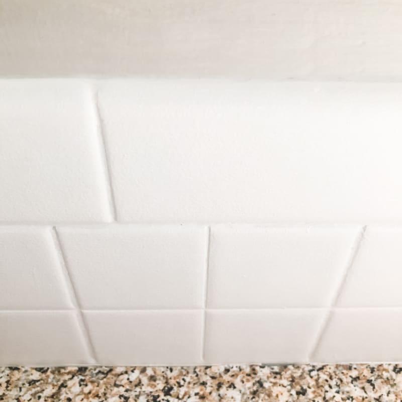 caulked backsplash tile edge