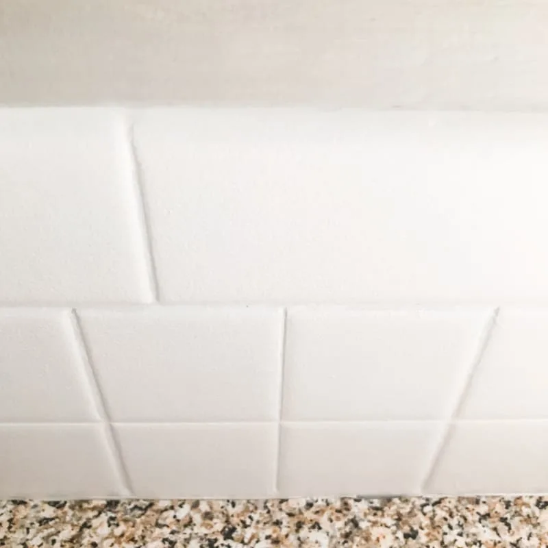 caulked backsplash tile edge