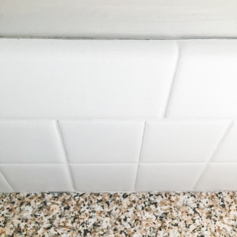 gap in top of backsplash tile paint